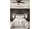 Beautiful bedroom with dark accent wall, comfortable bed, and soft lighting at 1147 Kelsneland Dr, Avon, IN 46123