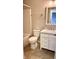 Bathroom featuring vanity with white cabinet, light fixtures, and tile flooring at 12551 Hawks Landing Dr, Fishers, IN 46037