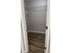 Walk-in closet with white wire shelving and wood floor at 12551 Hawks Landing Dr, Fishers, IN 46037
