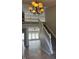Bright foyer showcases staircase and a spacious living area filled with natural light at 12551 Hawks Landing Dr, Fishers, IN 46037