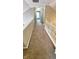 Second-floor hallway with carpet flooring and white trim at 12551 Hawks Landing Dr, Fishers, IN 46037
