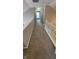 Upper hallway features neutral walls and carpet, plus white railing at 12551 Hawks Landing Dr, Fishers, IN 46037