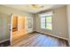 Office space featuring hardwood floors, a window and double doors leading to the entry at 12551 Hawks Landing Dr, Fishers, IN 46037