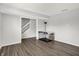 Spacious basement with gray walls, modern floors and staircase leading to the upper level at 12984 Shandon Ln, Fishers, IN 46038