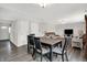 View of living room with wood floors and open space featuring a kitchen and dining room at 12984 Shandon Ln, Fishers, IN 46038
