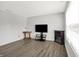 Cozy living room with modern floors and neutral walls at 12984 Shandon Ln, Fishers, IN 46038