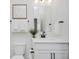 Clean, bright bathroom with white cabinets and a modern black faucet at 13324 Roundtop Rd, Noblesville, IN 46060