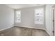 Bedroom featuring two bright, light-filled windows at 13324 Roundtop Rd, Noblesville, IN 46060