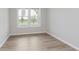 Bedroom with large windows with a view of the outdoors at 13324 Roundtop Rd, Noblesville, IN 46060
