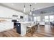 Bright kitchen with a large island, stainless appliances, and open floor plan at 13324 Roundtop Rd, Noblesville, IN 46060