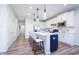 Modern kitchen featuring a large island, stainless steel appliances and ample storage at 13324 Roundtop Rd, Noblesville, IN 46060