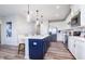 Modern kitchen with island, stainless steel appliances, and open to the living area at 13324 Roundtop Rd, Noblesville, IN 46060