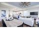 Open-concept living space with modern kitchen, dining area, and comfortable seating arrangement at 13324 Roundtop Rd, Noblesville, IN 46060