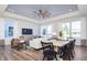 Open living room with a modern design, dining area, and plenty of natural light at 13324 Roundtop Rd, Noblesville, IN 46060