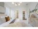 Comfortable main bedroom features neutral tones, soft textures, and ample natural light, creating a peaceful and inviting space at 13324 Roundtop Rd, Noblesville, IN 46060