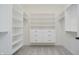 Spacious walk-in closet features ample shelving and storage, providing organized space for all your wardrobe needs at 13324 Roundtop Rd, Noblesville, IN 46060