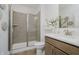 Well-lit bathroom featuring a glass enclosed shower, stylish vanity, and modern fixtures at 13355 Seven Springs Ln, Noblesville, IN 46060