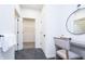 Bathroom vanity area leading to a walk-in closet at 13355 Seven Springs Ln, Noblesville, IN 46060