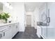 Elegant bathroom with double vanity, glass shower, and modern fixtures at 13355 Seven Springs Ln, Noblesville, IN 46060