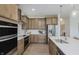 Gourmet kitchen with stainless appliances and ample counter space at 13355 Seven Springs Ln, Noblesville, IN 46060