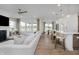 Open-concept living area with views of the kitchen and dining room at 13355 Seven Springs Ln, Noblesville, IN 46060