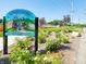 A colorful sign marks the Storybook Trail in Shelby County, amidst greenery and landscaping at 1428 Aster Dr, Shelbyville, IN 46176