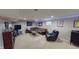 Spacious basement lounge with a comfortable seating area and entertainment center at 18247 Kinder Oak Dr, Noblesville, IN 46062