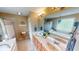 Elegant bathroom features a double vanity, tiled floors, a soaking tub, and a glass-enclosed shower at 18247 Kinder Oak Dr, Noblesville, IN 46062
