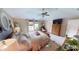 Bright bedroom offering a comfortable bed, window views, and stylish furnishings, perfect for relaxation at 18247 Kinder Oak Dr, Noblesville, IN 46062