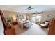 Inviting bedroom featuring a cozy bed, natural light, ceiling fan, and tasteful decor creating a peaceful retreat at 18247 Kinder Oak Dr, Noblesville, IN 46062