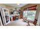 Bright office space with a large window, desk, and neutral carpet at 18247 Kinder Oak Dr, Noblesville, IN 46062