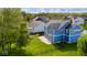 View of large backyard with patio and fence, perfect for outdoor living and entertaining at 18820 Wychwood Pl, Noblesville, IN 46062