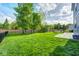 The spacious green backyard, perfect for outdoor activities at 18820 Wychwood Pl, Noblesville, IN 46062