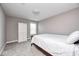 Comfortable bedroom featuring a full bed, white dresser, and a bright window at 18820 Wychwood Pl, Noblesville, IN 46062