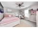 Cozy bedroom featuring a comfy bed, desk, and natural light at 18820 Wychwood Pl, Noblesville, IN 46062