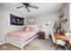 Comfortable bedroom with a large bed, desk, and decorative elements at 18820 Wychwood Pl, Noblesville, IN 46062