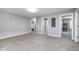 This large bonus room with neutral carpet provides flexible living space at 18820 Wychwood Pl, Noblesville, IN 46062
