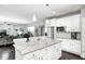 Stylish kitchen with a large island, stainless steel appliances, and pendant lighting at 18820 Wychwood Pl, Noblesville, IN 46062