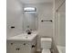 Bathroom featuring modern vanity, toilet, and tub with shower in a neutral color palette at 1918 Cornell Ave, Indianapolis, IN 46202
