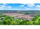 Expansive aerial view of a home nestled amongst farmland with a sprawling countryside landscape at 1933 S 825 E, Zionsville, IN 46077