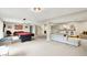 Spacious basement area featuring a pool table and a wet bar, ideal for entertaining guests at 1933 S 825 E, Zionsville, IN 46077