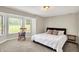 Bedroom with natural lighting and carpet flooring, as well as a rocking chair and side table at 1933 S 825 E, Zionsville, IN 46077