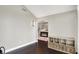 Spacious entry way with dark wood floors, neutral walls and a peek into the main hallway at 1933 S 825 E, Zionsville, IN 46077