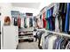 Organized walk-in closet with ample storage space, shelving, and hanging racks at 1933 S 825 E, Zionsville, IN 46077