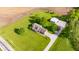 Idyllic property with a well-kept home, a vast green lawn, outbuilding and beautiful landscaping, a true rural retreat at 2221 W County Road 500 N, Danville, IN 46122
