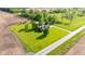 Expansive property showcasing a well-maintained home, green lawn, mature trees, and a peaceful country setting at 2221 W County Road 500 N, Danville, IN 46122