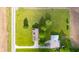 Scenic property featuring a charming home, extensive lawn, and functional outbuilding, set against a backdrop of farmland at 2221 W County Road 500 N, Danville, IN 46122