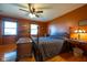 Bedroom featuring hardwood floors, a ceiling fan, and ample natural light at 2221 W County Road 500 N, Danville, IN 46122