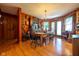 Dining room featuring rustic furniture, hardwood floors, and natural light at 2221 W County Road 500 N, Danville, IN 46122