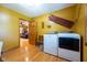 Laundry room with washer, dryer and a door to the living room at 2221 W County Road 500 N, Danville, IN 46122